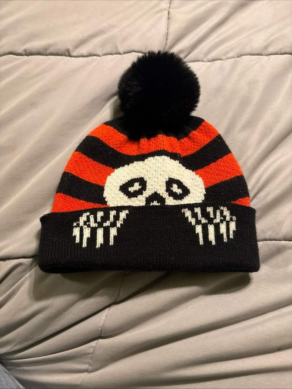 Black & Orange Pom Pom Skull Beanie